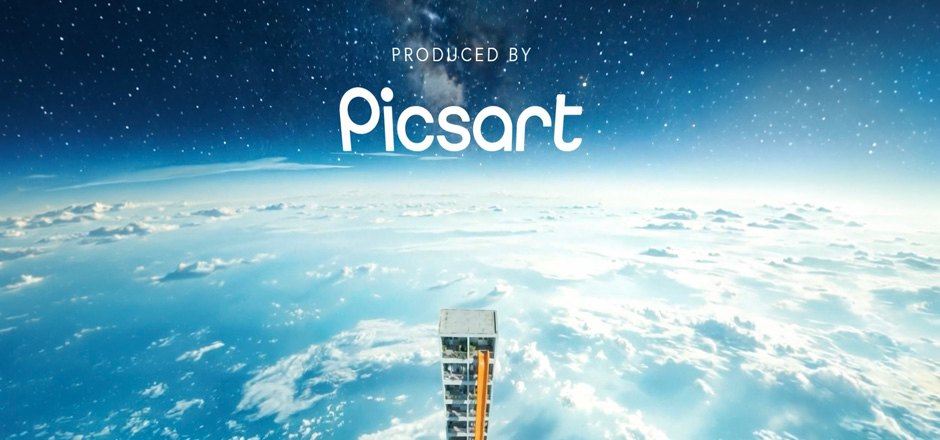 The Earth seen from space, a tower above it, “Produced by Picsart”